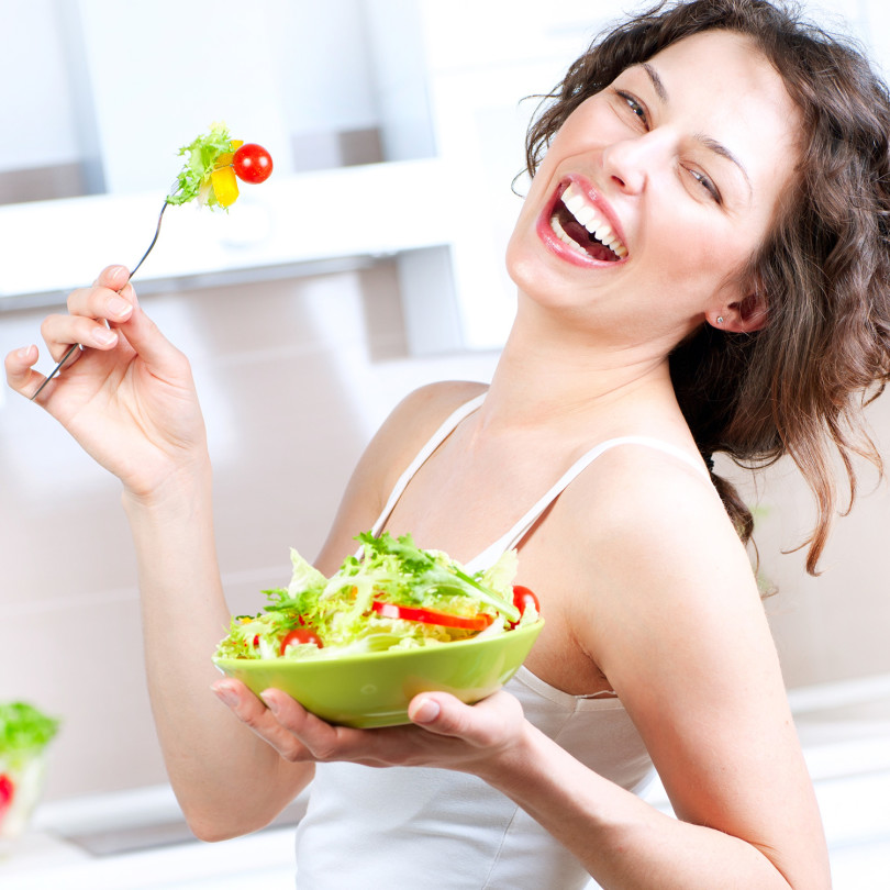 woman-salad-laugh-diet-810x810